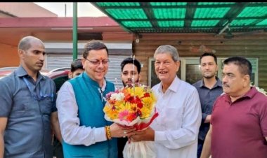 पूर्व सीएम हरीश रावत से मिले नए सीएम पुष्कर धामी